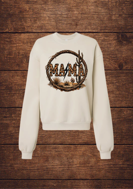 White sweatshirt with 'MAMA' design on a wooden background