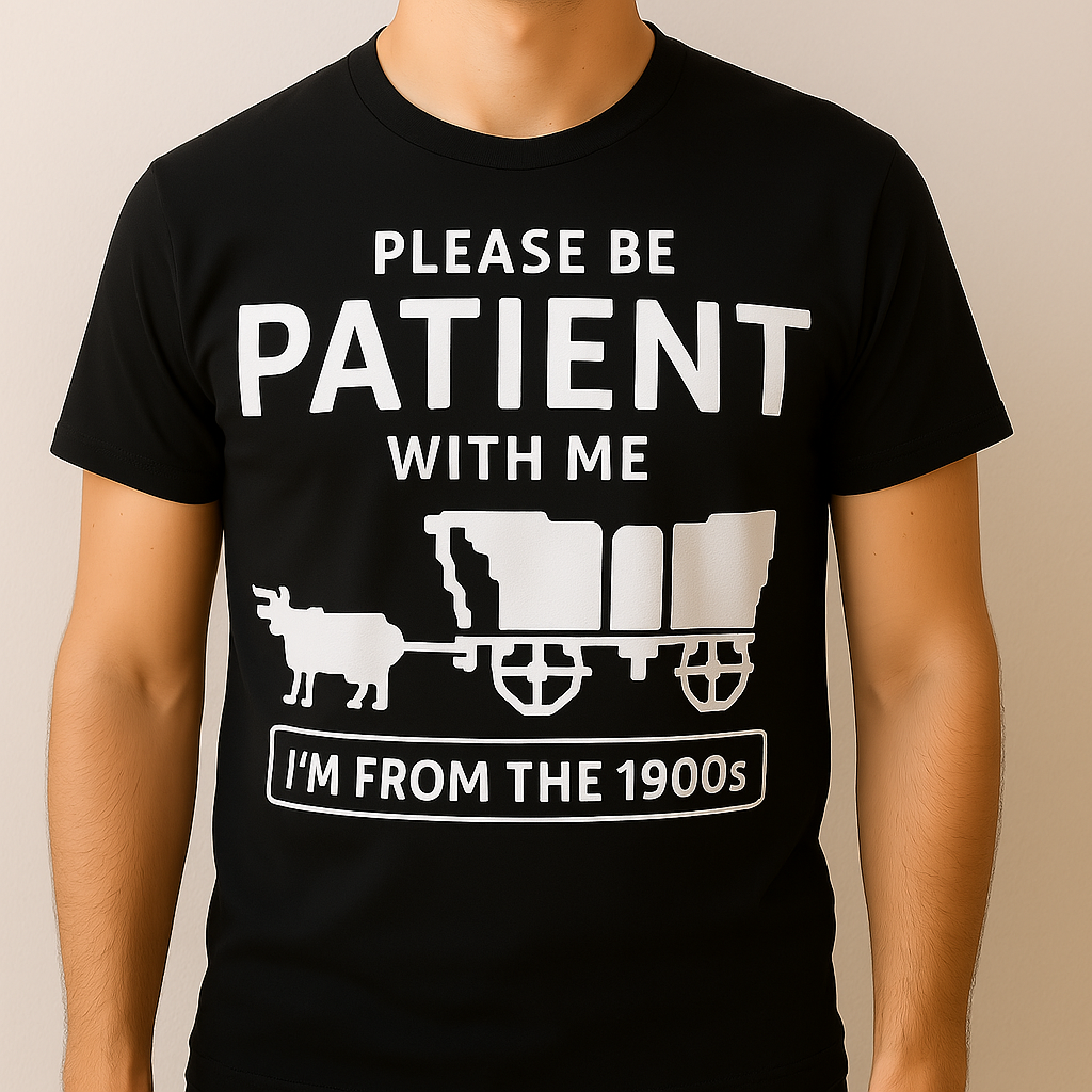 Black t-shirt with white text and graphic of a ox cart, worn by a person. Oregon tail themed shirt that speaks to every Millennial! We all died of dysentery  