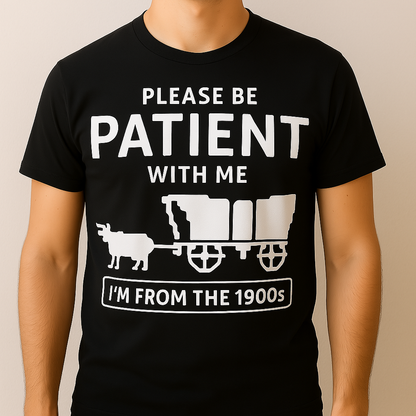 Black t-shirt with white text and graphic of a ox cart, worn by a person. Oregon tail themed shirt that speaks to every Millennial! We all died of dysentery  