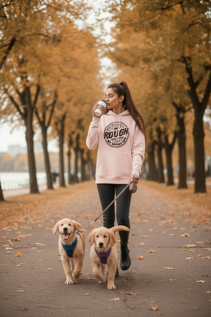 Woman wearing Life Is Rough heavyweight hoodie outdoors