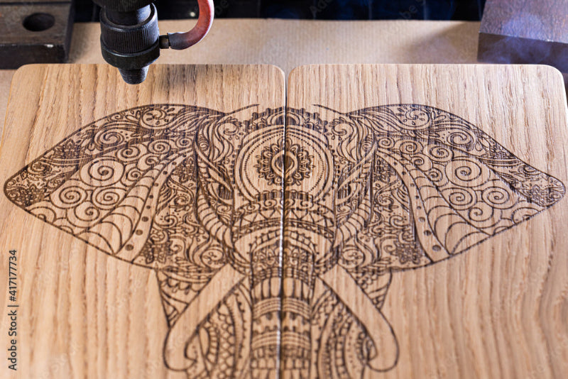 Wooden board with intricate laser-engraved elephant design